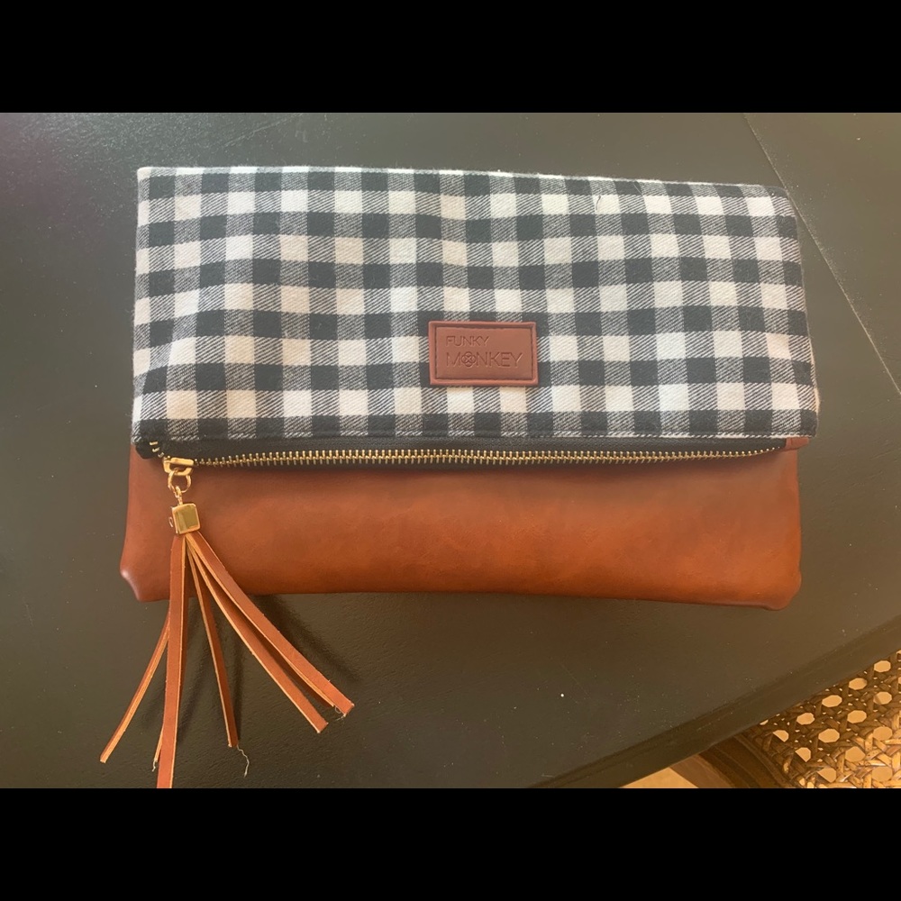 Flannel and leather clutch